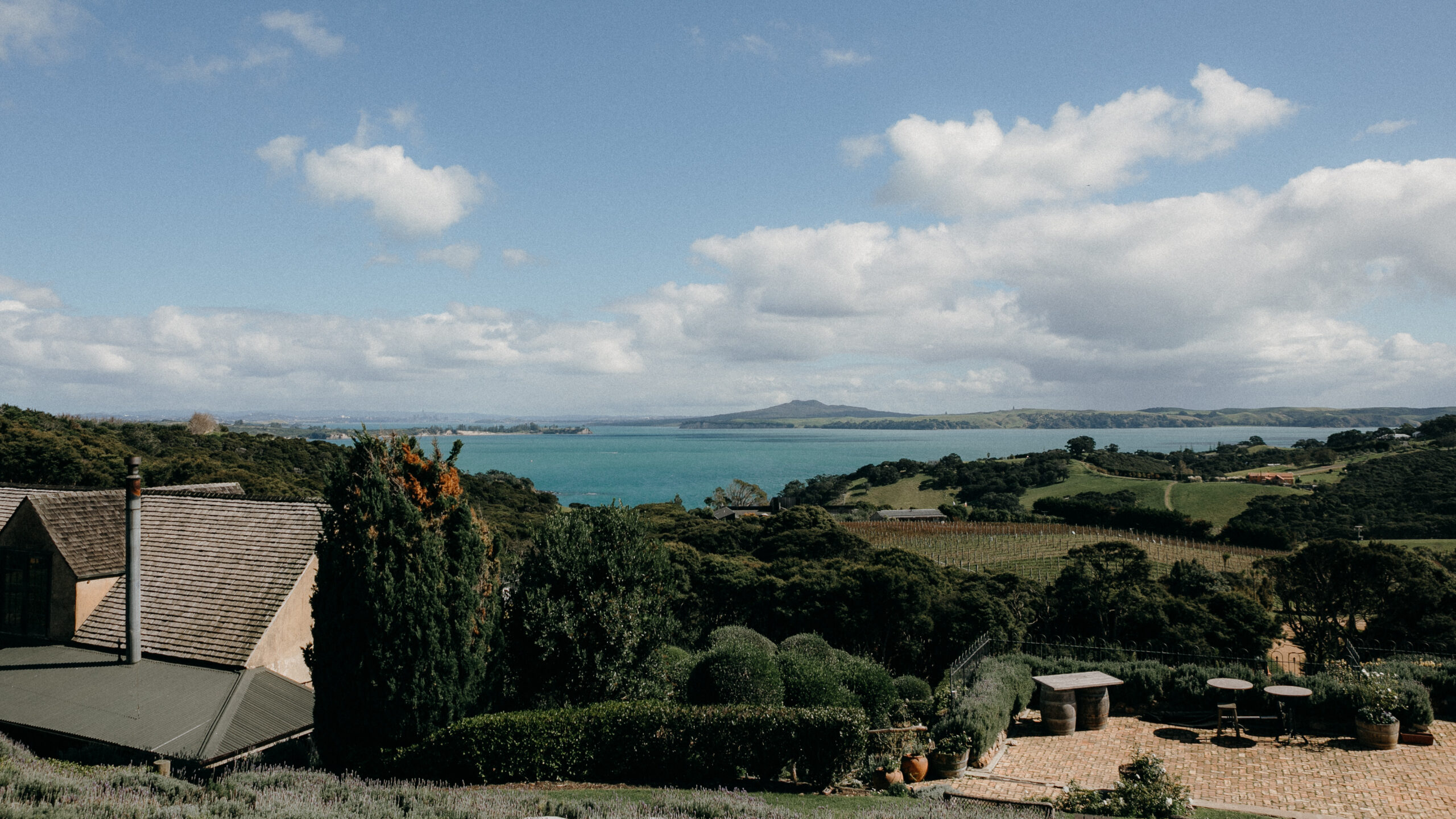 View of Mudbrick Estate, Rangitoto Island and Auckland City, photo by Sarah Weber Photography