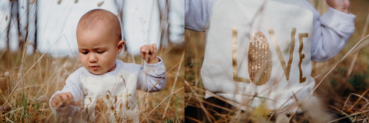 Baby lifestyle portrait photo taken in long grass at muriwai by sarah weber photography