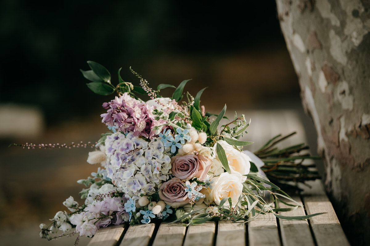 Bride's flowers at Herald Island Wharf in Whenuapai, Auckland photo by Sarah Weber Photography
