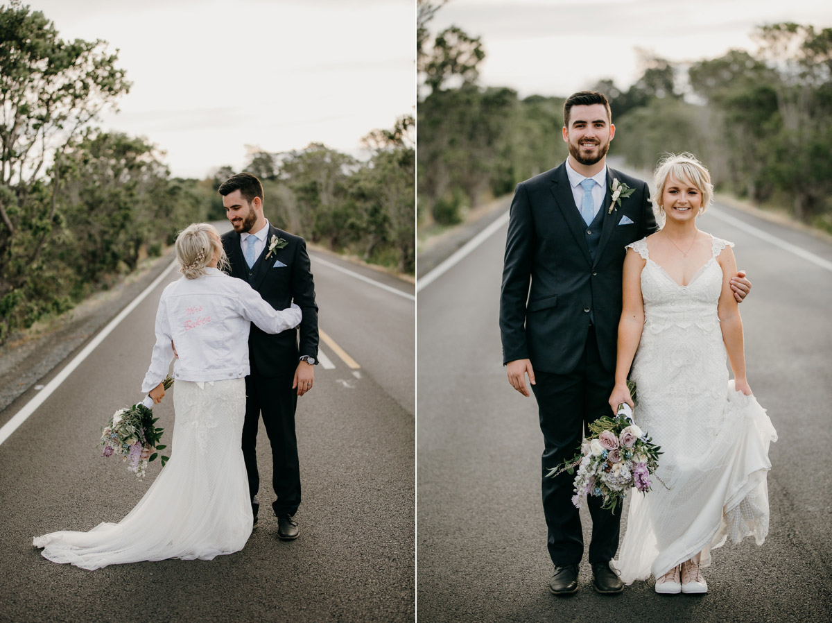 Bride and Groom posing on Herald Island Road in Whenuapai, Auckland photo by Sarah Weber Photography
