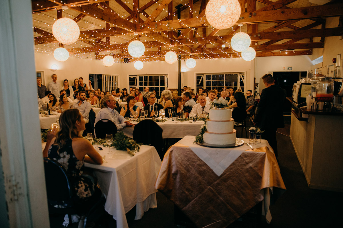 Guests seated and speeches at The Brigham wedding reception venue photo by Sarah Weber Photography