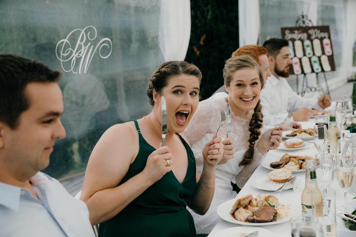 bridesmaid bring silly during wedding reception at bridgewater country estate venue in Kaukapakapa, Auckland photo by sarah weber photography