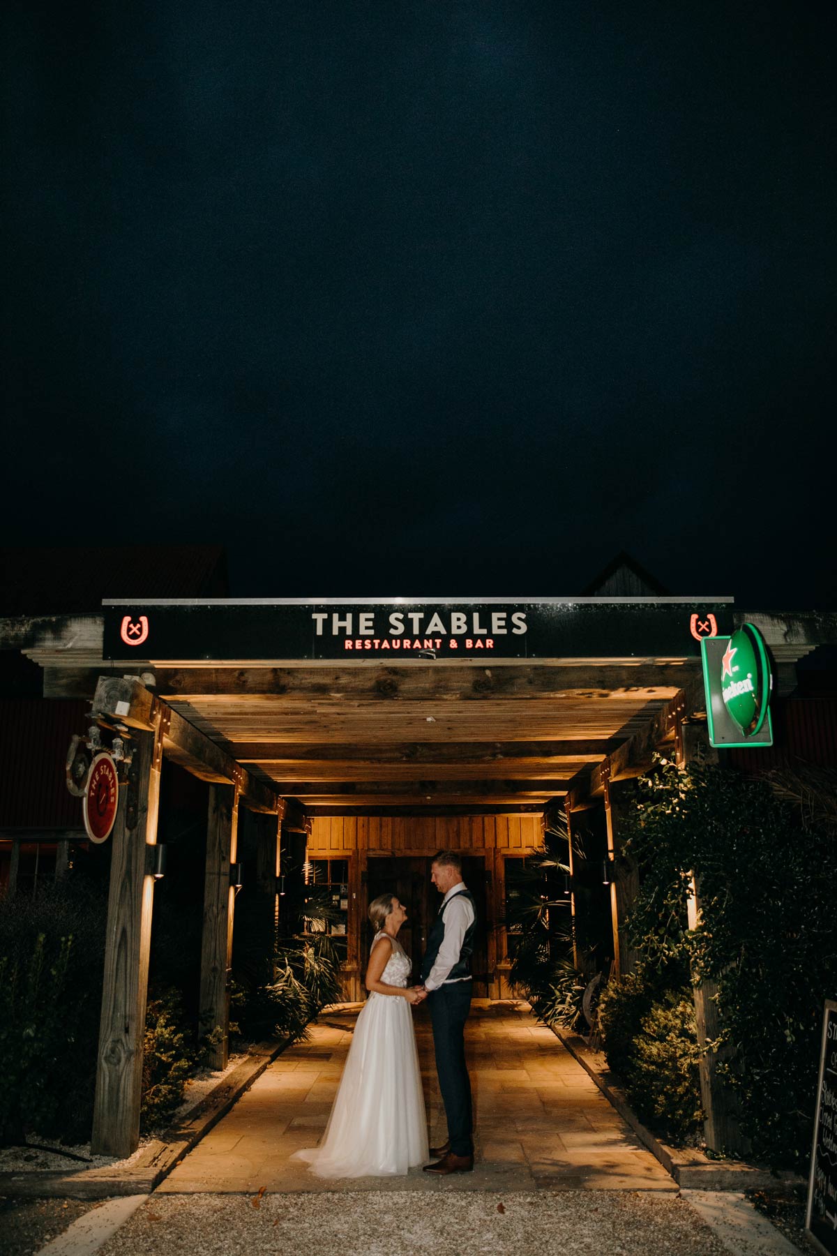 bride and groom night creative evening photos outside the stables matakana wedding venue by sarah weber photography