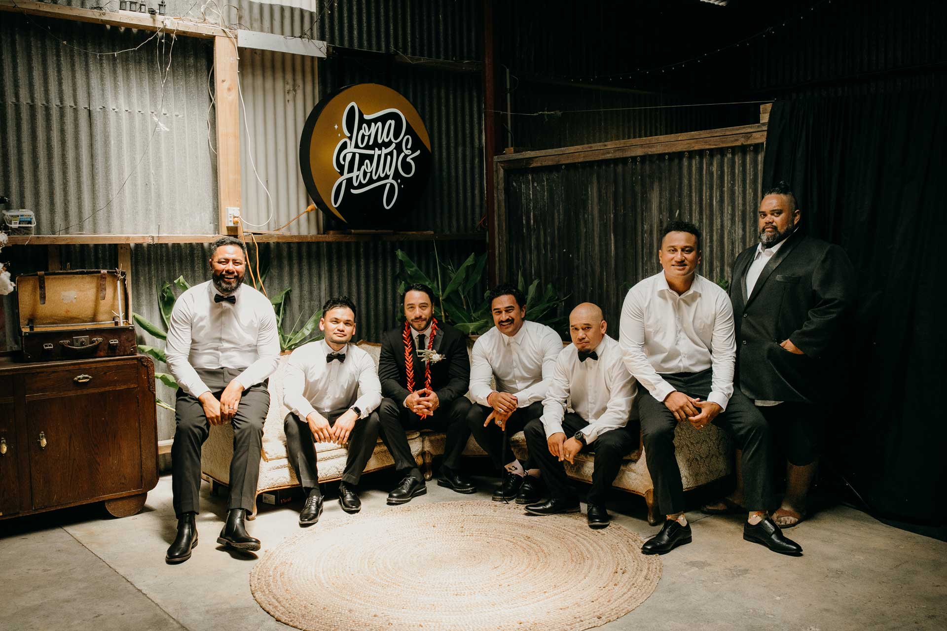 groomsmen wedding portrait at rustic barn in auckland photo by sarah weber photography