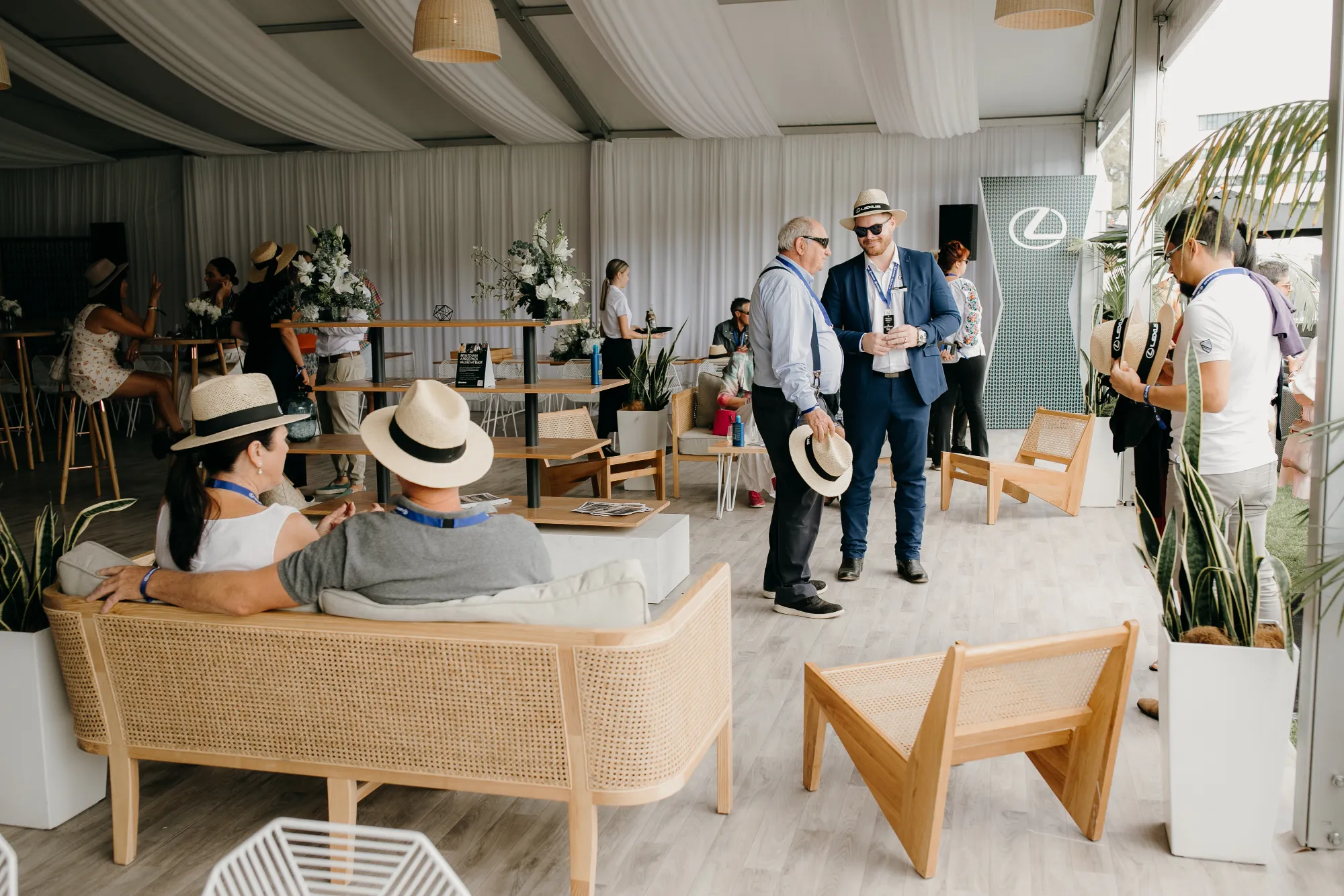 Guests socialising inside the Lexus tent at Lexus Urban Polo, photo by Sarah Weber Photography